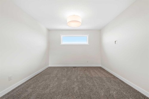305 Precedence View, Cochrane, AB - Indoor Photo Showing Other Room