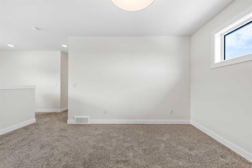 305 Precedence View, Cochrane, AB - Indoor Photo Showing Other Room