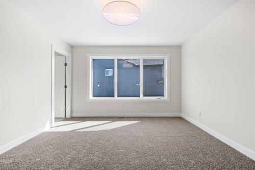 305 Precedence View, Cochrane, AB - Indoor Photo Showing Other Room