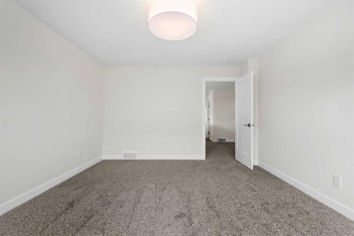 305 Precedence View, Cochrane, AB - Indoor Photo Showing Other Room