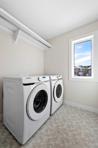 305 Precedence View, Cochrane, AB - Indoor Photo Showing Laundry Room
