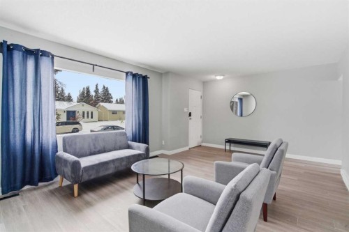 173 Gordon Drive Sw, Calgary, AB - Indoor Photo Showing Living Room