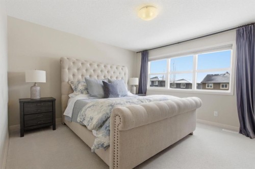 132 Sundown Way, Cochrane, AB - Indoor Photo Showing Bedroom