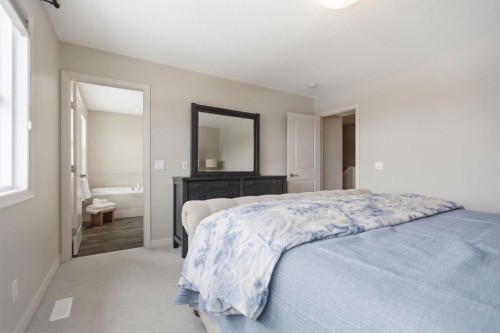 132 Sundown Way, Cochrane, AB - Indoor Photo Showing Bedroom