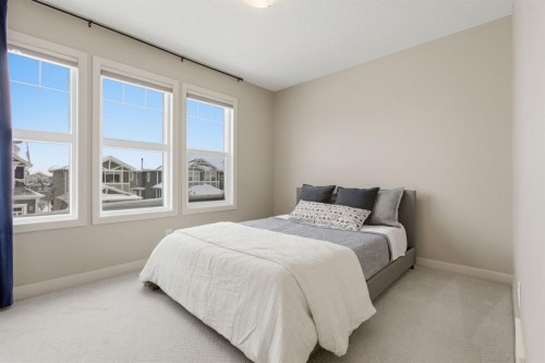 132 Sundown Way, Cochrane, AB - Indoor Photo Showing Bedroom