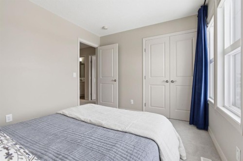 132 Sundown Way, Cochrane, AB - Indoor Photo Showing Bedroom