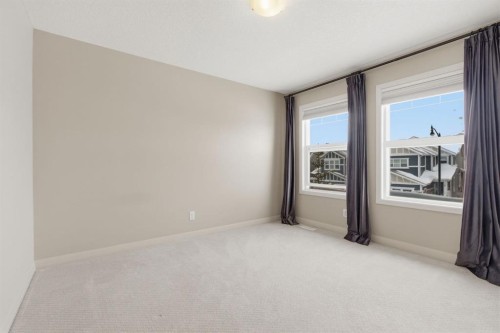 132 Sundown Way, Cochrane, AB - Indoor Photo Showing Other Room