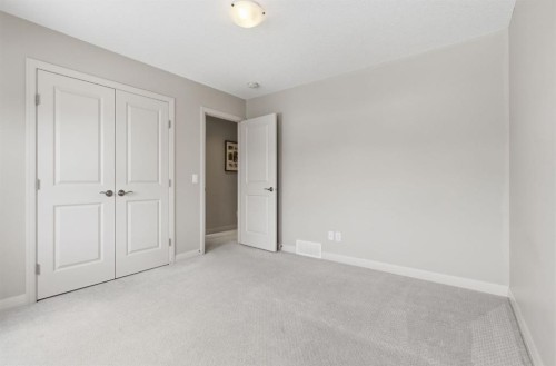 132 Sundown Way, Cochrane, AB - Indoor Photo Showing Other Room