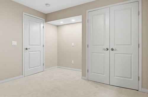 132 Sundown Way, Cochrane, AB - Indoor Photo Showing Other Room