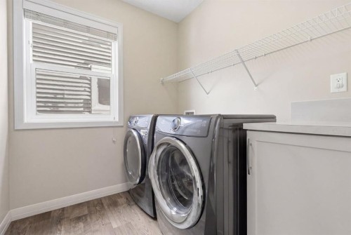 132 Sundown Way, Cochrane, AB - Indoor Photo Showing Laundry Room