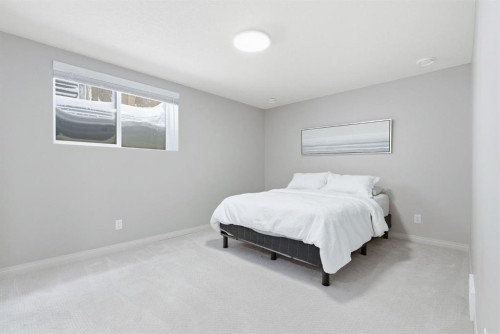 132 Sundown Way, Cochrane, AB - Indoor Photo Showing Bedroom