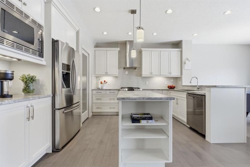 132 Sundown Way, Cochrane, AB - Indoor Photo Showing Kitchen With Stainless Steel Kitchen With Upgraded Kitchen