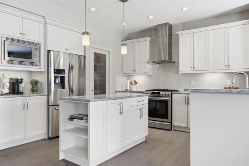 132 Sundown Way, Cochrane, AB - Indoor Photo Showing Kitchen With Stainless Steel Kitchen With Upgraded Kitchen