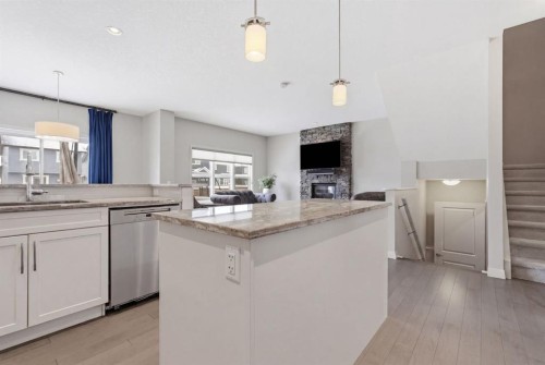 132 Sundown Way, Cochrane, AB - Indoor Photo Showing Kitchen
