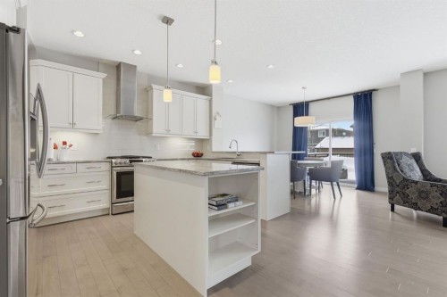 132 Sundown Way, Cochrane, AB - Indoor Photo Showing Kitchen With Stainless Steel Kitchen With Upgraded Kitchen
