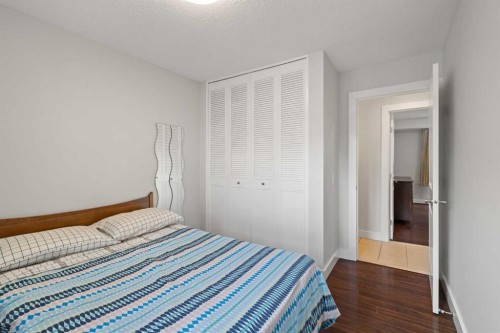 208 Woodpark Place Sw, Calgary, AB - Indoor Photo Showing Bedroom