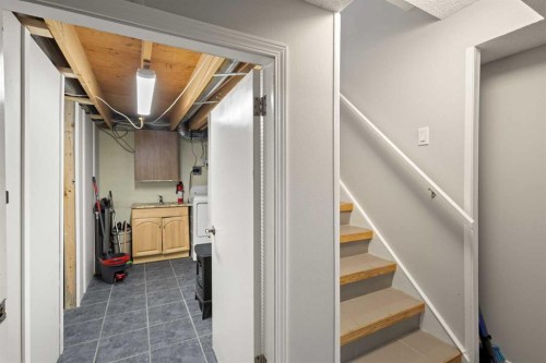 208 Woodpark Place Sw, Calgary, AB - Indoor Photo Showing Other Room