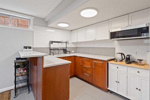 208 Woodpark Place Sw, Calgary, AB - Indoor Photo Showing Kitchen