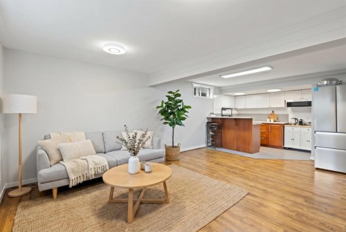 208 Woodpark Place Sw, Calgary, AB - Indoor Photo Showing Living Room