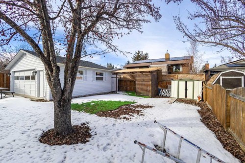 208 Woodpark Place Sw, Calgary, AB - Outdoor