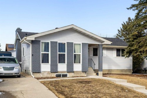208 Woodpark Place Sw, Calgary, AB - Outdoor