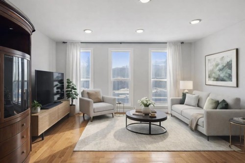 208 Woodpark Place Sw, Calgary, AB - Indoor Photo Showing Living Room