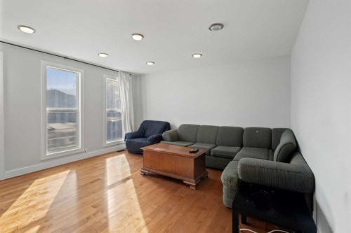 208 Woodpark Place Sw, Calgary, AB - Indoor Photo Showing Living Room
