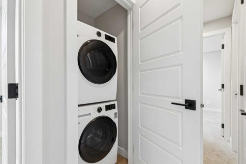37 Cottageclub Lane, Rural Rocky View County, AB - Indoor Photo Showing Laundry Room