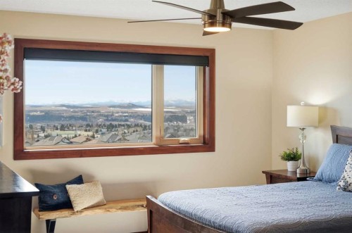 185 Sunset Circle, Cochrane, AB - Indoor Photo Showing Bedroom