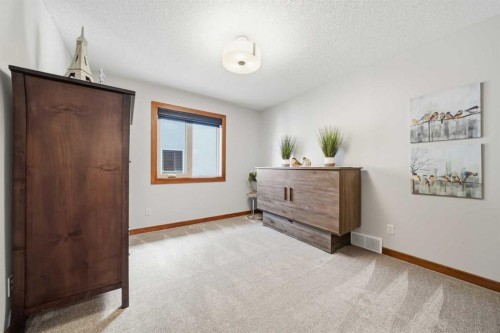 185 Sunset Circle, Cochrane, AB - Indoor Photo Showing Other Room