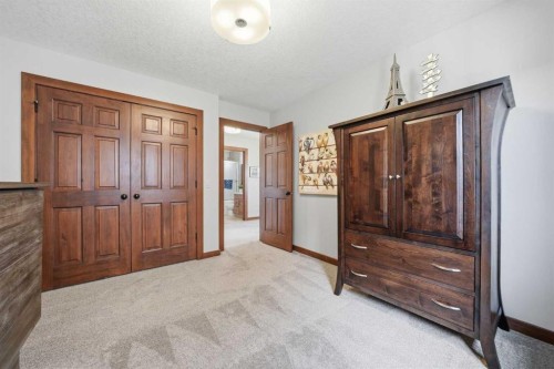 185 Sunset Circle, Cochrane, AB - Indoor Photo Showing Other Room