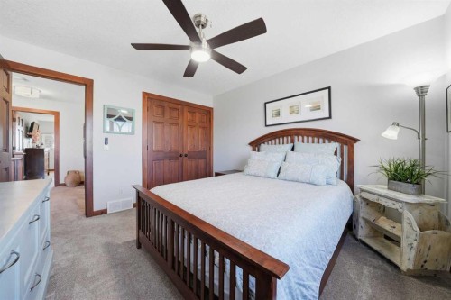 185 Sunset Circle, Cochrane, AB - Indoor Photo Showing Bedroom