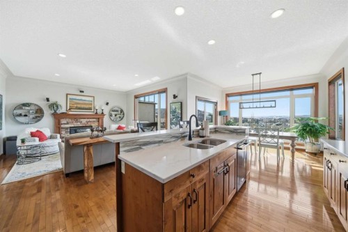 185 Sunset Circle, Cochrane, AB - Indoor Photo Showing Kitchen With Double Sink