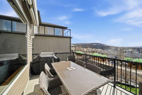 185 Sunset Circle, Cochrane, AB - Outdoor With Exterior