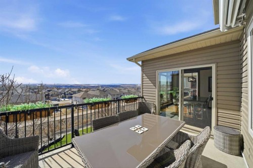 185 Sunset Circle, Cochrane, AB - Outdoor With Deck Patio Veranda With Exterior