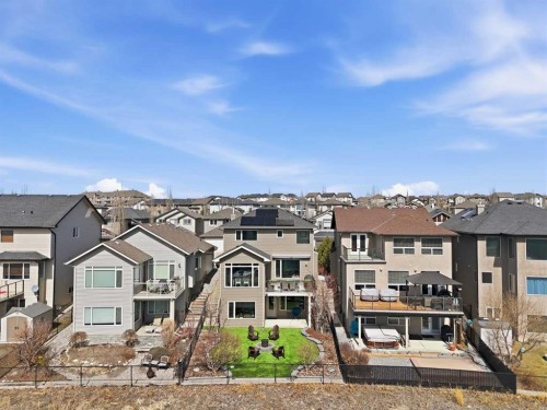 185 Sunset Circle, Cochrane, AB - Outdoor With Facade