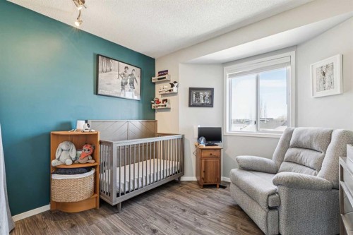 27 Rivercrest Way Se, Calgary, AB - Indoor Photo Showing Bedroom