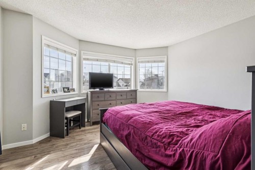 27 Rivercrest Way Se, Calgary, AB - Indoor Photo Showing Bedroom