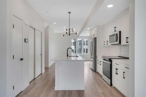 804A-120 Arbour Lake Court Nw, Calgary, AB - Indoor Photo Showing Kitchen With Upgraded Kitchen