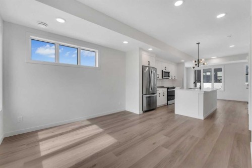 804A-120 Arbour Lake Court Nw, Calgary, AB - Indoor Photo Showing Kitchen With Stainless Steel Kitchen With Upgraded Kitchen