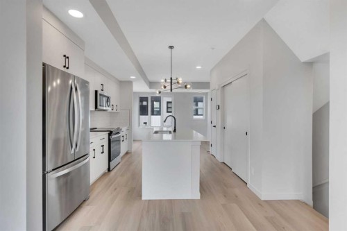 804A-120 Arbour Lake Court Nw, Calgary, AB - Indoor Photo Showing Kitchen With Stainless Steel Kitchen With Upgraded Kitchen