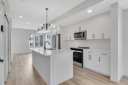 804A-120 Arbour Lake Court Nw, Calgary, AB - Indoor Photo Showing Kitchen With Upgraded Kitchen