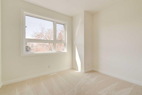 39B Moncton Road Ne, Calgary, AB - Indoor Photo Showing Other Room