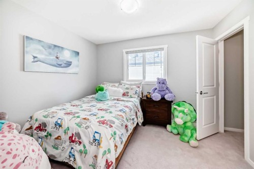 64 Nolancrest Manor Nw, Calgary, AB - Indoor Photo Showing Bedroom