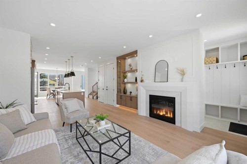 8140 47 Avenue Nw, Calgary, AB - Indoor Photo Showing Living Room With Fireplace