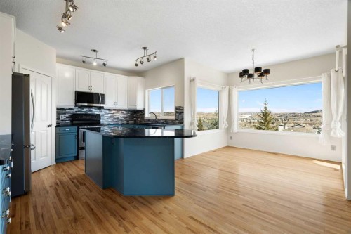 38 Bow Ridge Link Link, Cochrane, AB - Indoor Photo Showing Kitchen With Upgraded Kitchen