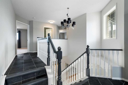 38 Bow Ridge Link Link, Cochrane, AB - Indoor Photo Showing Other Room