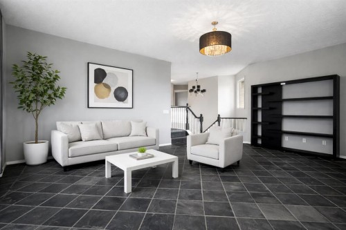 38 Bow Ridge Link Link, Cochrane, AB - Indoor Photo Showing Living Room