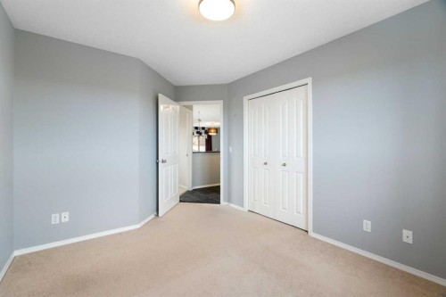 38 Bow Ridge Link Link, Cochrane, AB - Indoor Photo Showing Other Room