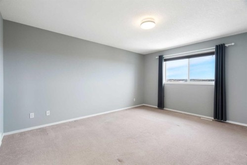 38 Bow Ridge Link Link, Cochrane, AB - Indoor Photo Showing Other Room